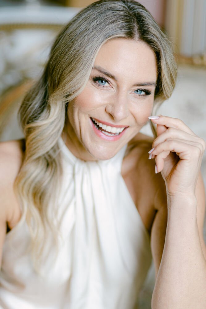 Mature bride to be wearing natural makeup and wavy hair